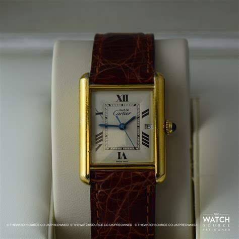 cartier tank must preowned